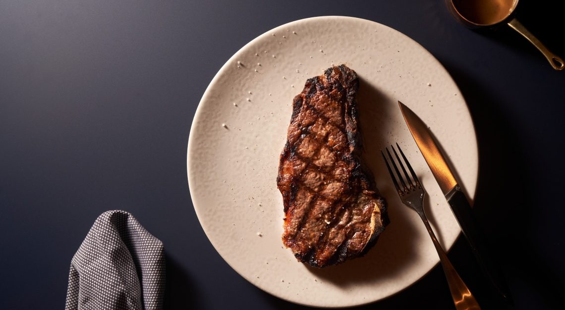 Bone-in Sirloin Club Steak butchers block