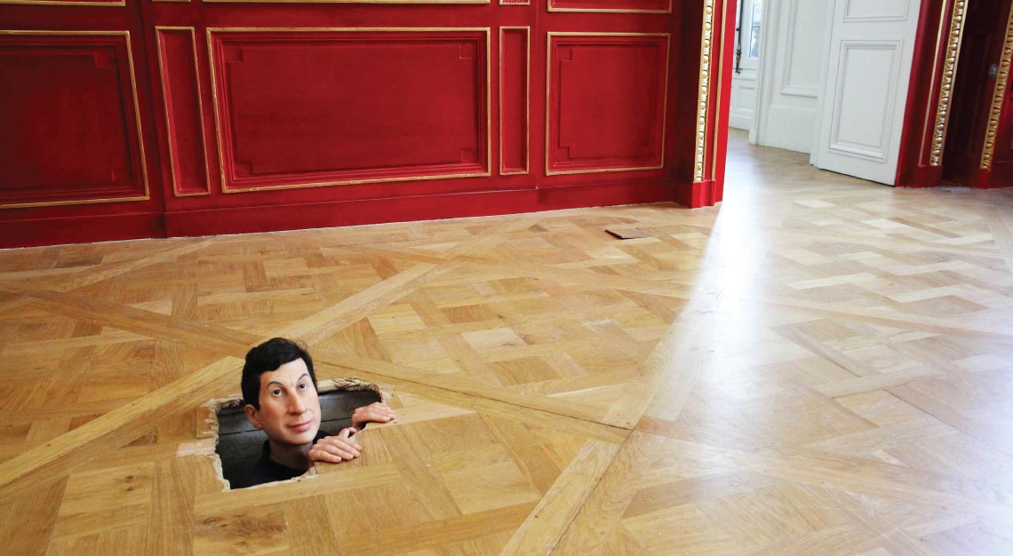 Maurizio Cattelan man-in-floor